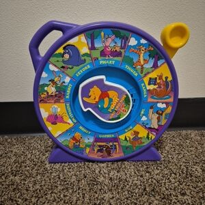 Disney Winnie the Pooh Spinner Story Toy - Purple, Blue & Yellow